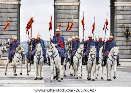 MADRID, SPAIN - FEB 12: Royal Guards participate in the Changing of the Guard at Royal Palace the first Wednesday of each month on february 12, 2014 in Madrid, Spain.