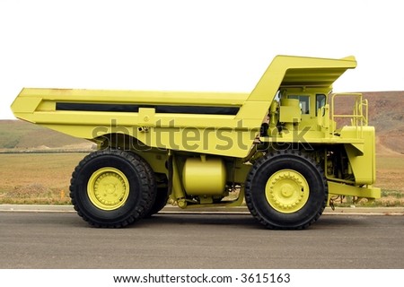 Large Yellow Quarry Truck, Top of image is isolated on white so that you can place your object in the truck bed