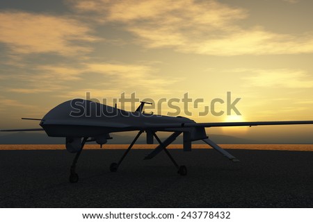 General Atomics MQ-1 Predator Drone. Drone parked in the desert at sunset.