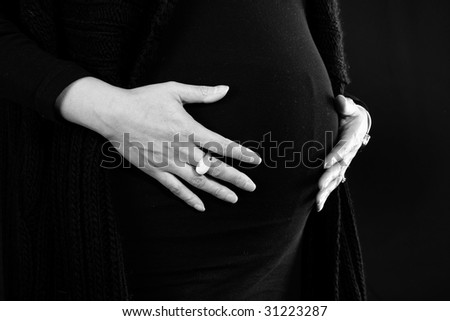 pregnant women, middle section with hands