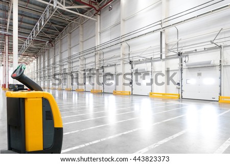 Big distribution warehouse with gates for loading goods