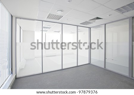 Empty Office Room With Glass Walls And Doors