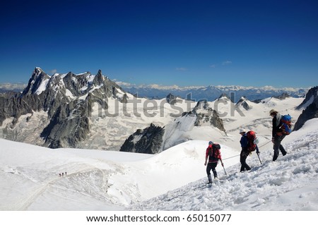 Climbers in a high winter mountain