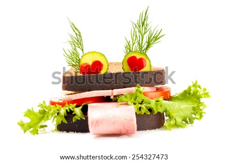 Amusing frog sandwich with adoring eyes for child on white background.