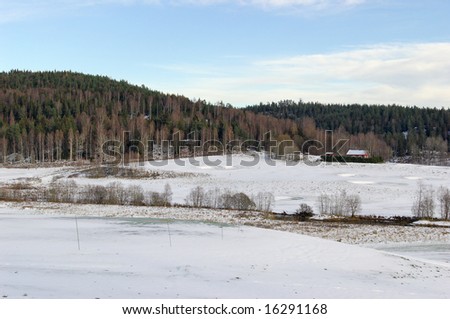 Open golf fields, covered by snow. Located in Losby, Norway
