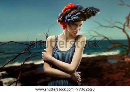 fashion picture of young woman with creative and colorful hairstyle