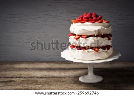Pavlova: A Cake Made From Layers of Meringue, Whipped Cream, and Fresh Berries