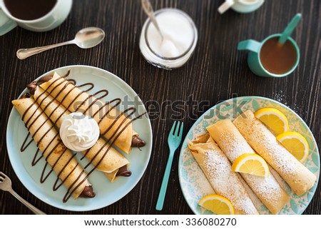 Chocolate Nutella Dessert Crepes and Lemon Powdered Sugar Crepes with Coffee