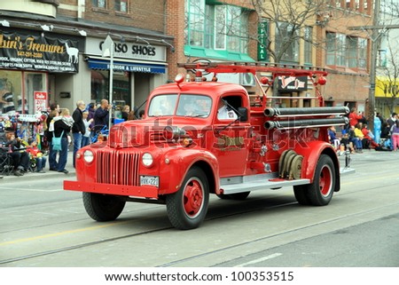 TORONTO - APRIL 8: A Toronto fire department vehicle during a street parade on April 8, 2012 in Toronto. Toronto Fire Services counts on 3,100 men divided in 83 fire stations.