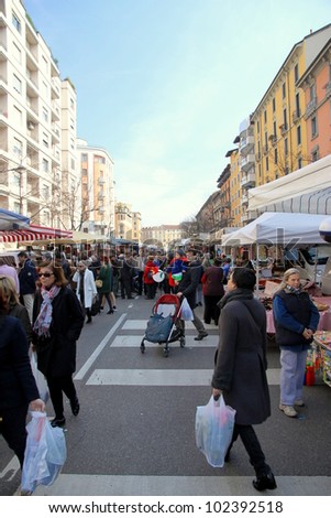 MILAN - MARCH 11: A street market on March 11, 2012 in Milan, Italy. The city has a population of about 1.3 million while its urban area is the 5th largest in EU with a population of over 4.3 million.