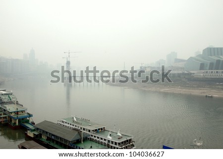 CHONGQING - MARCH 18: A view of the city and the Yangtze river on March 18, 2012 in Chongqing. Chongqing is the largest direct-controlled municipality and comprises 19 districts and 15 counties.