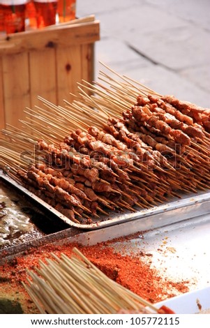 CHONGQING - MARCH 19: A stand selling lamb skewers on March 19, 2012 in Chongqing. According to the Food and Agriculture Organization, 2.5 billion people eat street food every day.