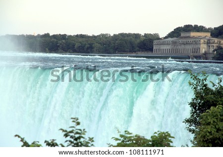 NIAGARA FALLS - JUNE 30: A view of the Niagara Falls on June 30, 2012 in Niagara Falls, Canada. More than 4 million cubic feet of water falls over the crest line every minute on average flow.