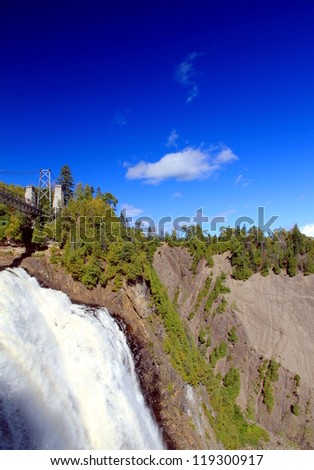 QUEBEC CITY - SEPTEMBER 10: Water flowing at the Montmorency Falls on September 10, 2012 in Quebec City. The falls, at 84 meters (275 ft) high, are the highest in the province of Quebec.