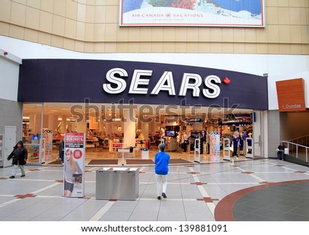 Toronto - May 13: The Main Entrance Of A Sears Department Store On May 13, 2013 In Toronto. The Company Was Founded By Richard Warren Sears And Alvah Curtis Roebuck In 1893 As A Mail Order Catalog.
