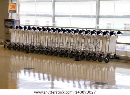 TORONTO - MAY 10: Baggage carts at the Pearson Airport on May 10, 2013 in Toronto. Pearson is by far the largest and busiest airport in Canada and is one of the world\'s largest air transportation hubs