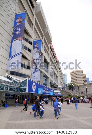 TORONTO - JUNE 8: Outside the Rogers Centre before a Blue Jays baseball game on June 8, 2013 in Toronto, Canada. The Blue Jays were founded in Toronto in 1977, initially owned by the Labatt Brewing Company.