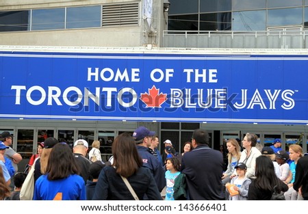 TORONTO - JUNE 8: Outside the Rogers Centre before a Blue Jays game on June 8, 2013 in Toronto, Canada. The Blue Jays were founded in Toronto in 1977 and initially owned by the Labatt Brewing Company