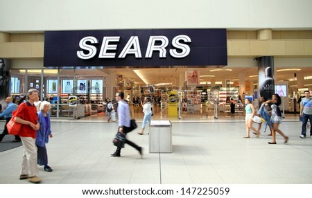 Toronto - July 12: The Main Entrance Of A Sears Department Store On July 12, 2013 In Toronto. The Company Was Founded By Richard Warren Sears And Alvah Curtis Roebuck In 1893 As A Mail Order Catalog.