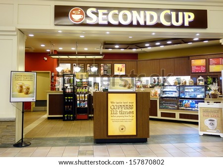 TORONTO - OCTOBER 4: A Second Cup cafe on October 4, 2013 in Toronto. Second Cup is Canada\'s largest Canadian-based specialty coffee retailer, operating more than 360 cafÃ?ÃÂ©s across Canada.