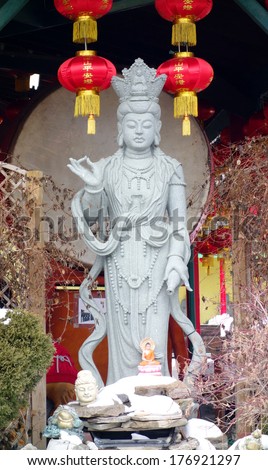 TORONTO, CANADA - JANUARY 31, 2014: Buddhist statue at the Thornhill Buddhist temple just outside Toronto for the 2014 Chinese New Year.