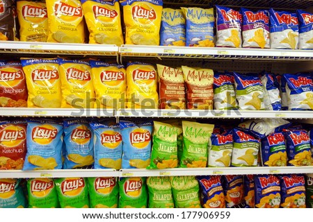TORONTO, CANADA - FEBRUARY 11, 2014: Potato chips selection in a supermarket in Toronto, Canada.