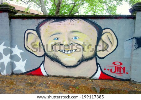 MILAN, ITALY - APRIL 19, 2014: Wayne Rooney graffiti outside San Siro stadium in Milan, Italy.