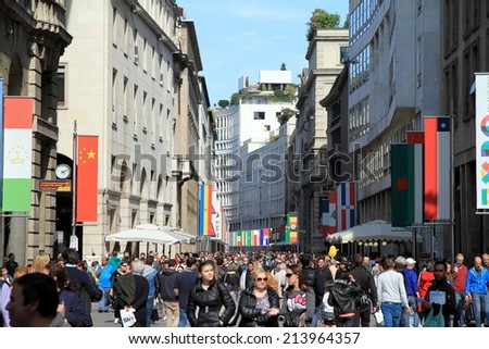 MILAN, ITALY - APRIL 20, 2014: A view of the crowd in Corso Vittorio Emanuele in the center of Milan, Italy.
