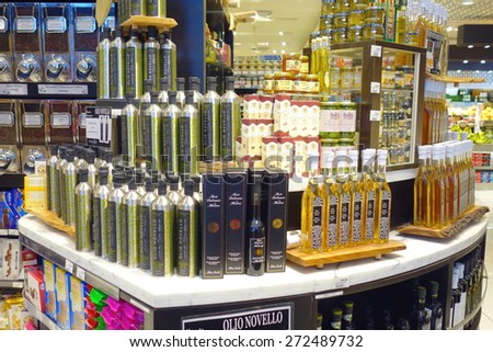 TORONTO, CANADA - MARCH 28, 2015: A selection of gourmet olive oil bottles in a supermarket in Toronto, Canada.