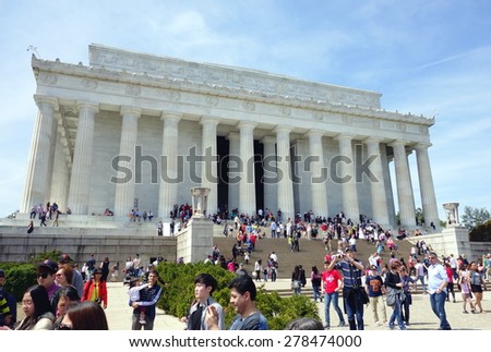 WASHINGTON DC, USA - APRIL 12, 2015: People visit Abraham Lincoln memorial in Washington. 18.9 million tourists visited capital of the United States.