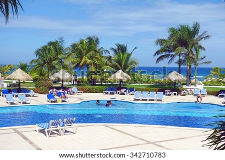 MONTEGO BAY, JAMAICA - SEPTEMBER 10, 2015: Exclusive resort grounds and swimming pool in Montego Bay, Jamaica.