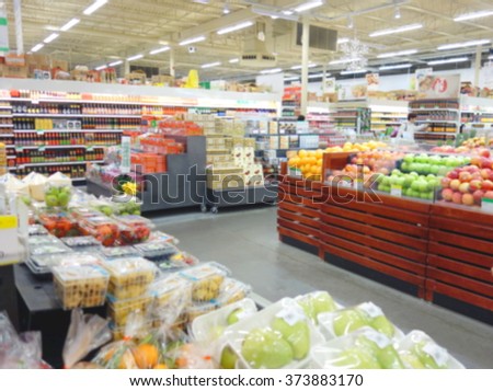 Blurred produce section at a supermarket in Toronto, Canada