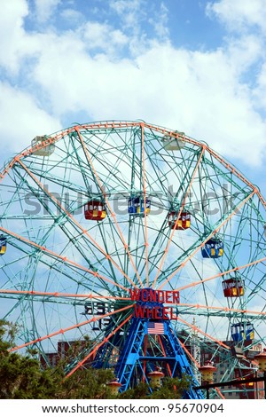 NEW YORK - JULY 16: Coney Island\'s Wonder Wheel on July 16, 2011 in New York. The Wonder Wheel is a 45.7-meters tall eccentric Ferris wheel located in Coney Island, Brooklyn, New York City, USA.