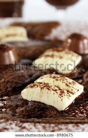 Chocolate bonanza with white chocolate chunks, melted chocolate and cocoa.