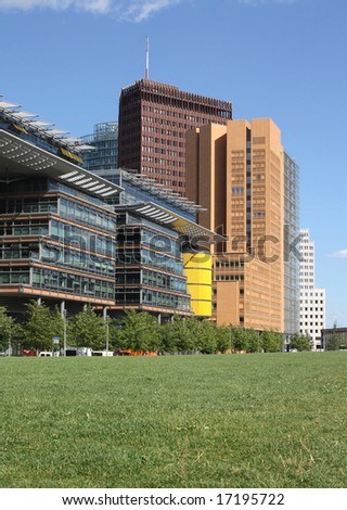 Office buildings in various shapes and forms, with writing area in the lawn.
