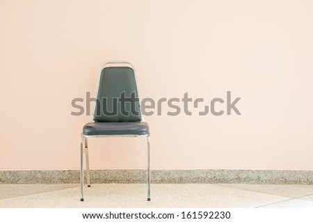 Chair against wall