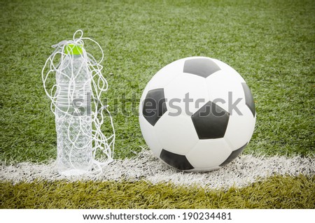 Soccer ball and water bottle