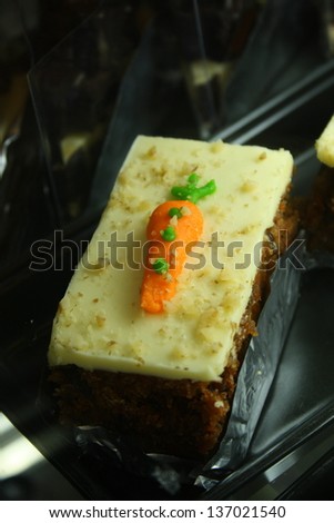 carrot cake in show case in bakery shop