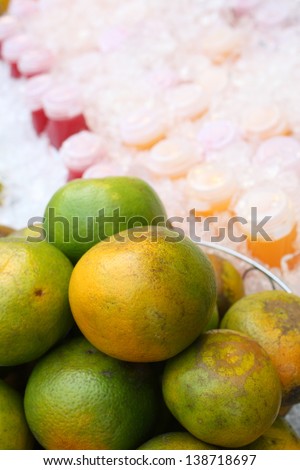 orange and chilled of bottle of ready to drink of fruit juice for sale in local market