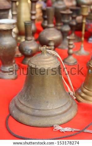 ancient bronze bell for sale in a native  ancient market in chiang mai, thailand