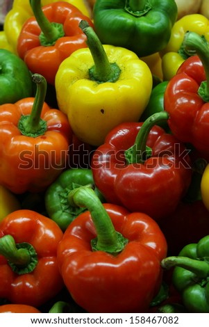 pile of colorful sweet pepper at night time in local market