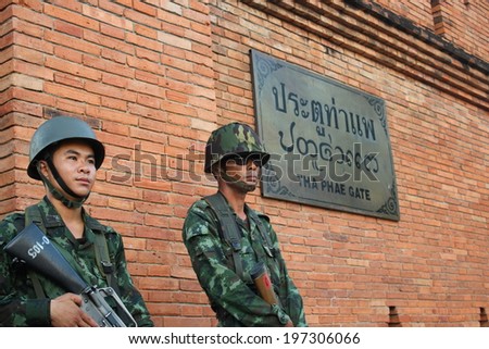 CHIANG MAI,THAILAND-MAY 24 : The soldiers of the junta come into the city to control people that against coup or junta by symbolic speech and show activity, On May24, 2014.
