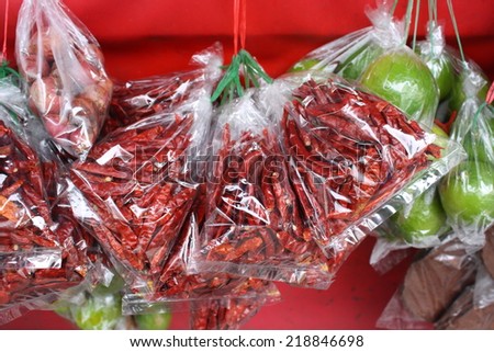 dried red chili in plastic bag for retail sale in local market