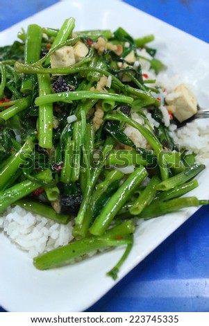 stir fried water spinach with cooked, stir fried morning glory with cooked rice