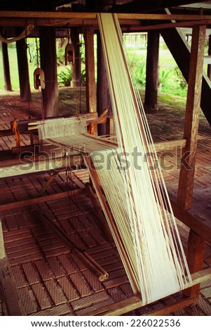 CHIANG MAI,THAILAND-OCT25 : Native handloom of Tai Lue. Tai lue is a native people in Thailand, in Tai Lue\'s way of life2014 (process to be vintage style) ,On Oct25, 2014. in Chiang Mai, Thailand.