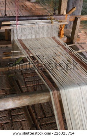 CHIANG MAI,THAILAND-OCT25 : Native handloom of Tai Lue. Tai lue is a native people in Thailand, in Tai Lue's way of life2014 (process to be vintage style) ,On Oct25, 2014. in Chiang Mai, Thailand.