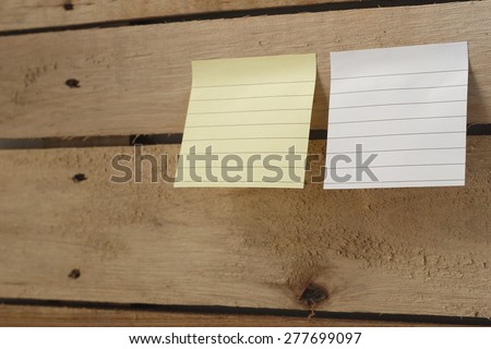 note pad paper or note paper pasting on messy wooden panel
