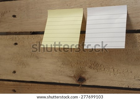 note pad paper or note paper pasting on messy wooden panel
