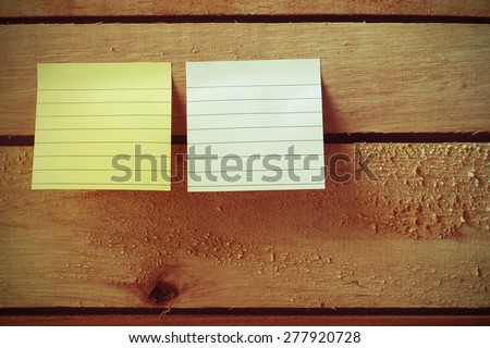 vintage colour style of note pad paper or note paper pasting on messy wooden panel