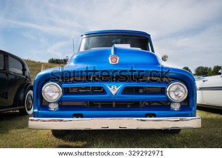 WESTLAKE, TEXAS - OCTOBER 17, 2015: Front view of a blue 1953 Ford F100 pickup truck classic car.